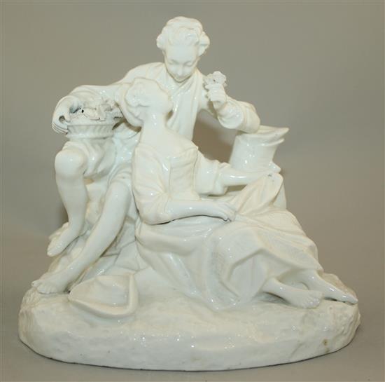 A Continental white glazed porcelain group of two lovers, late 19th century, 19cm, slight restoration